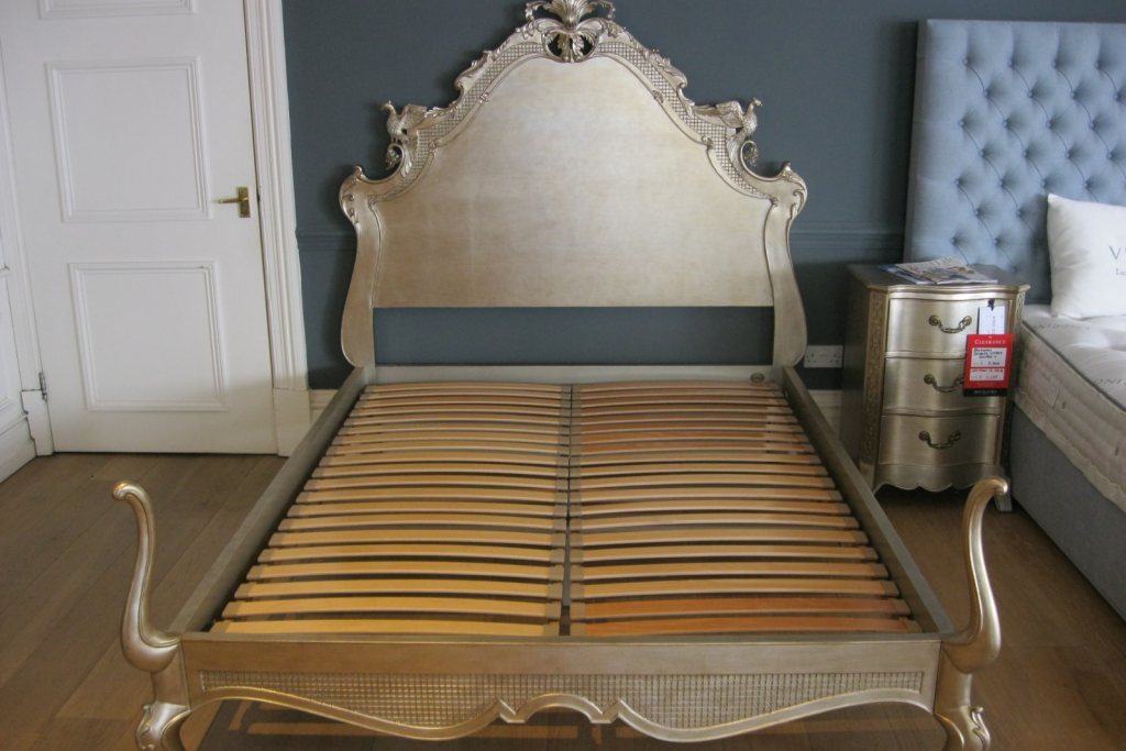 Slatted base store for antique bed