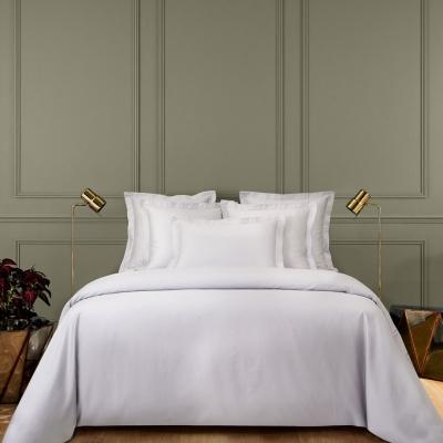 Spotlight on Yves Delorme's Triomphe bed linen set in Silver. Channel the approaching frosty season w...